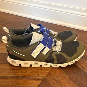 On Running Black and Olive Sneakers with Blue Accent